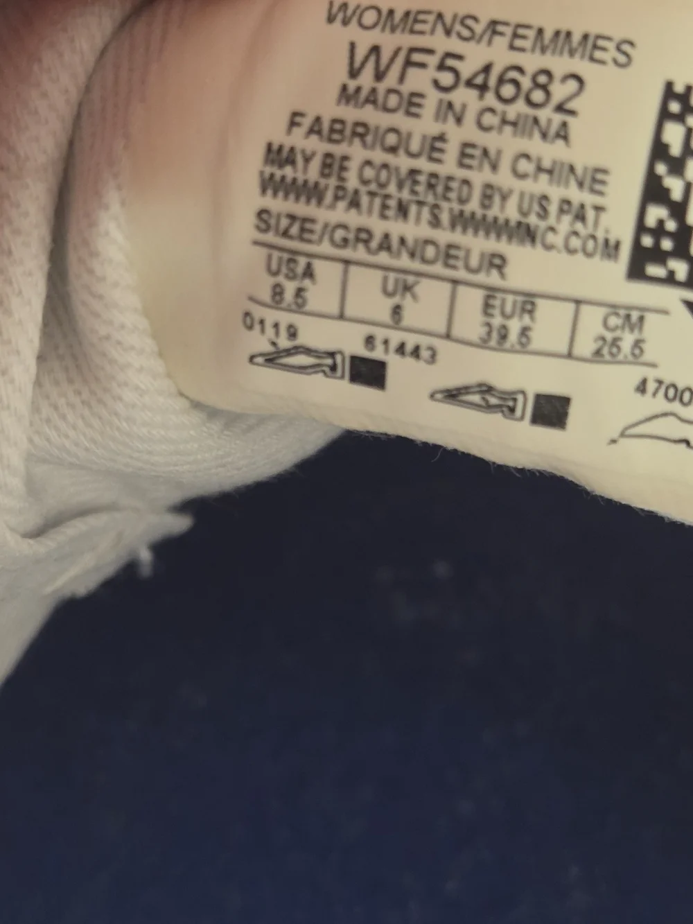 Keds Women's White Kickstart Canvas Low-Top Sneakers with Subtle Blue Trim.